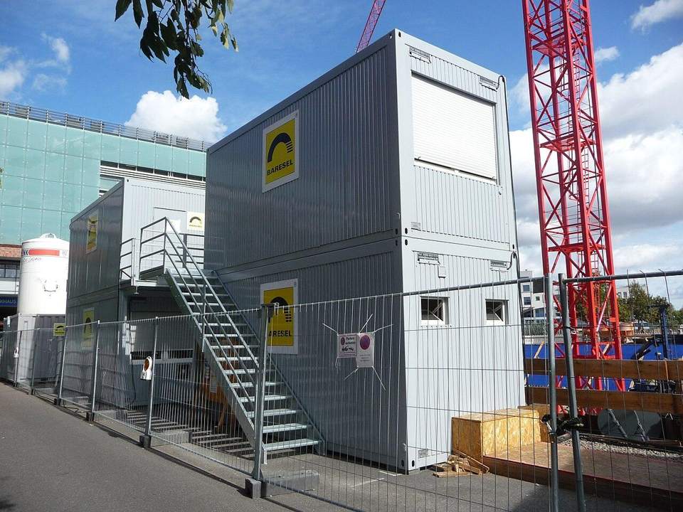 Stacked modified container site offices with stairs